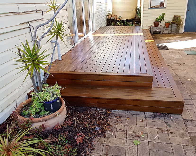 Raised timber deck platform installed in sloped Albany WA backyard.