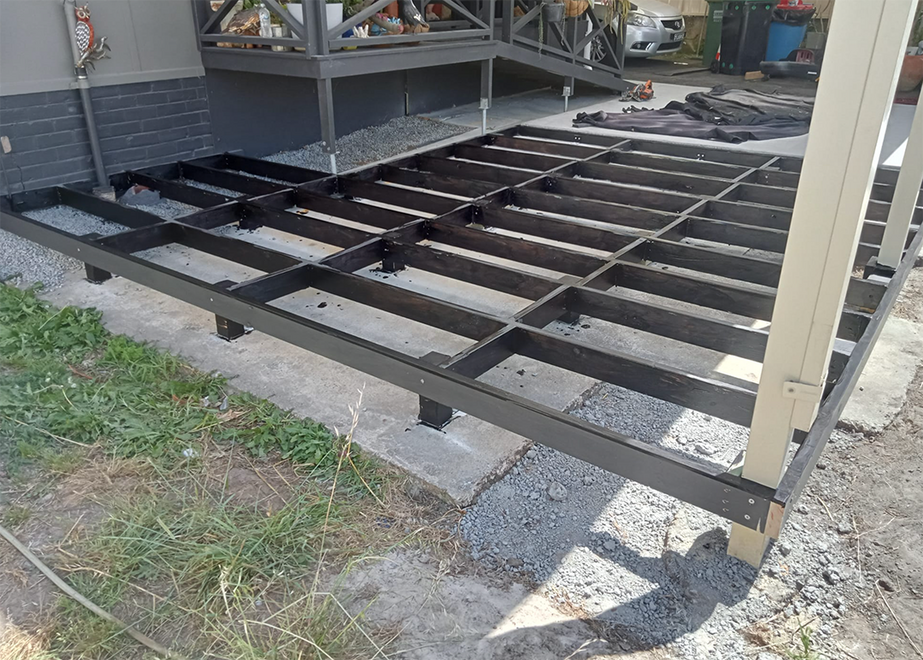Timber deck frame construction by Albany WA carpenter for residential backyard.