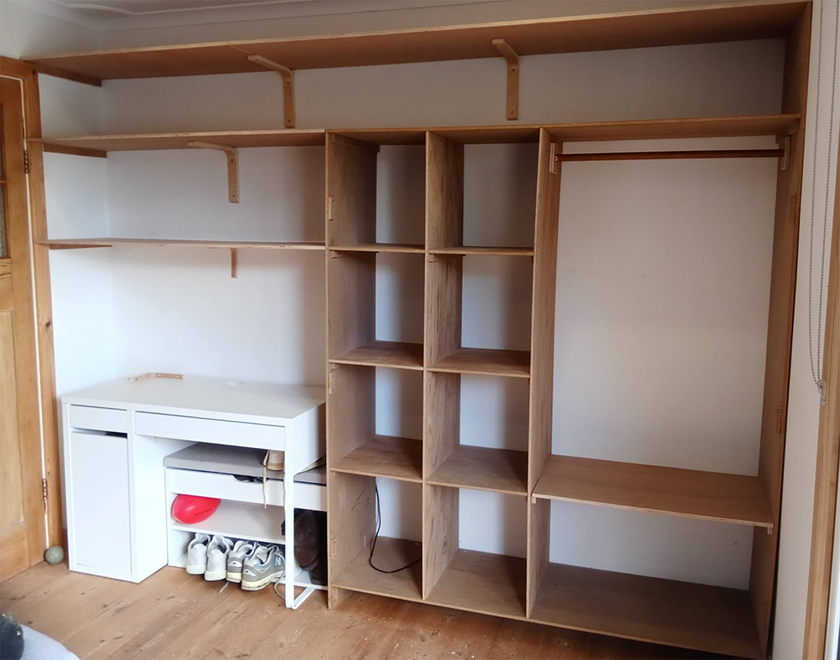 Custom wardrobe shelving and storage unit built by Albany carpenter.